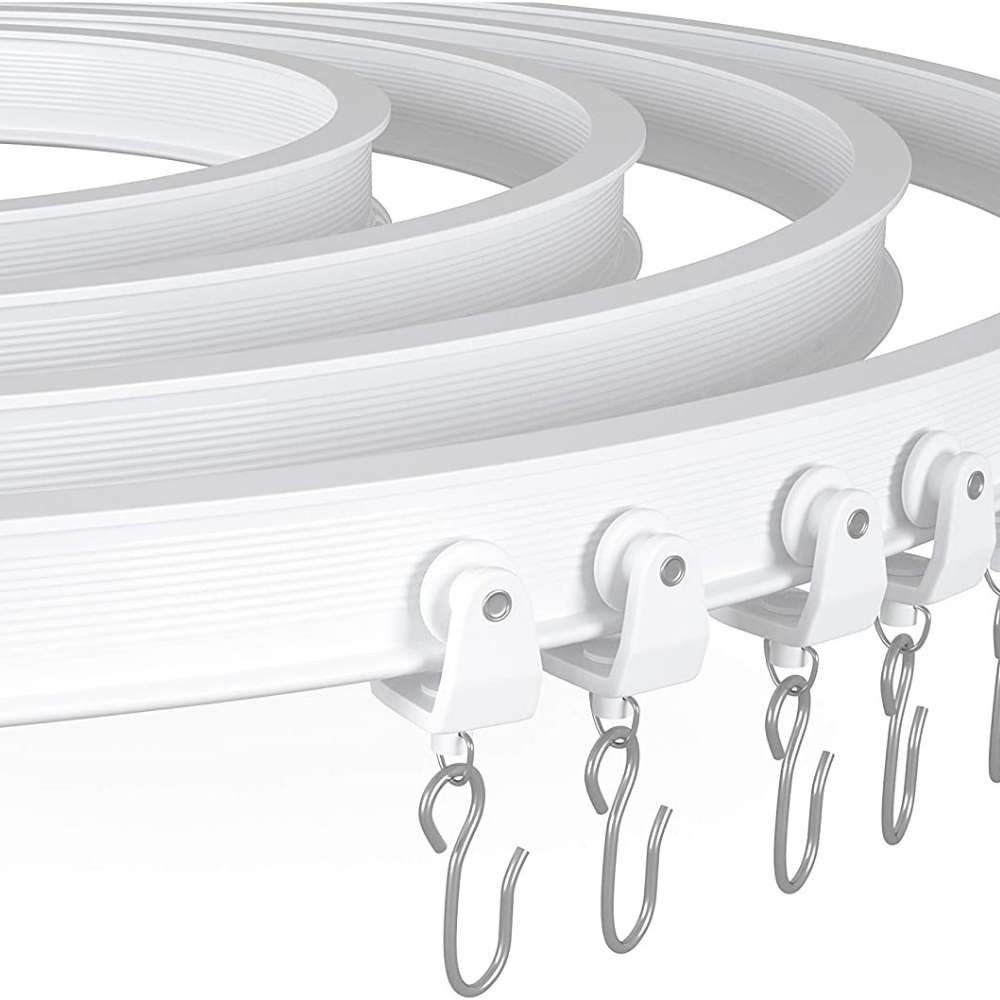 Flexible ceiling curtain track arranged for a curtain run